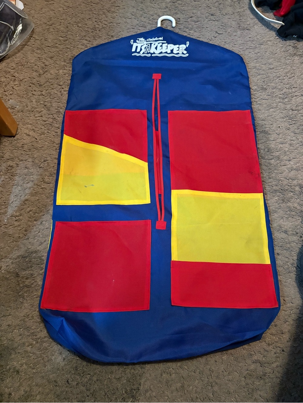 The Original 'It’s a Keeper ' Travel Garment Bag in Blue, Red & Yellow